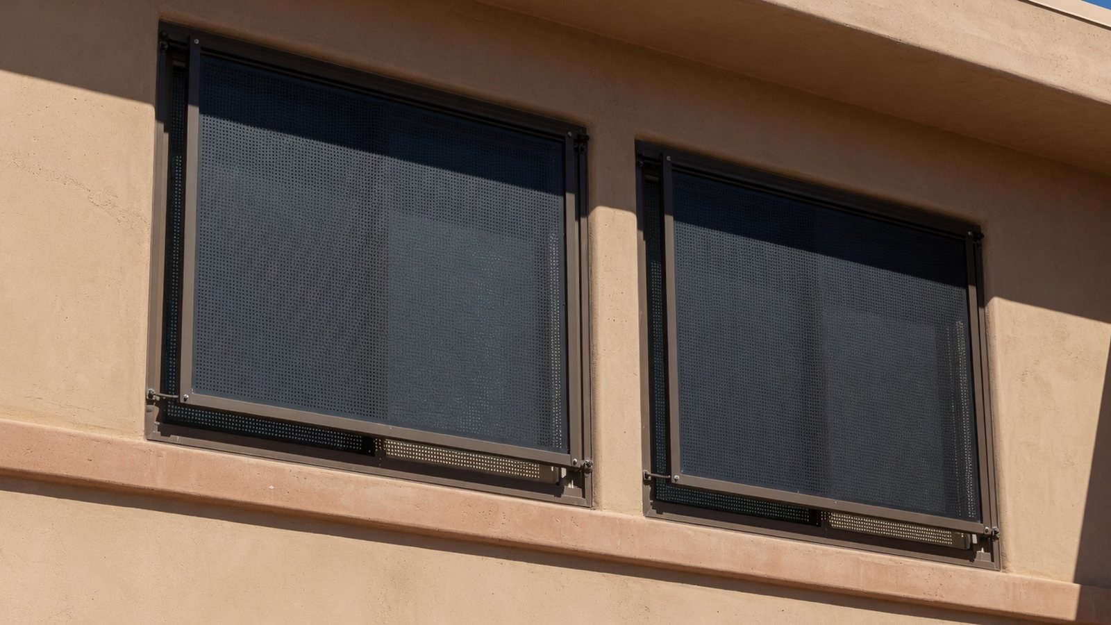 Custom solar screens on second-story Scottsdale home windows.